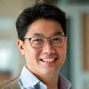 Headshot of David Chen, smiling warmly.