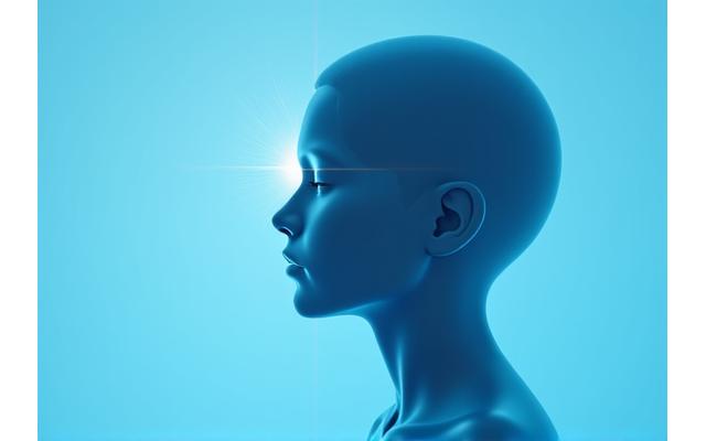 A focused individual with subtle light over their head, representing mental clarity and enhanced concentration.